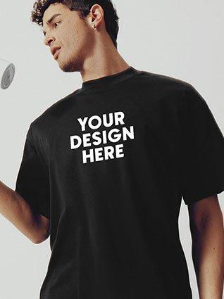 Man is wearing a black T-shirt with the inscription "Your design here."
