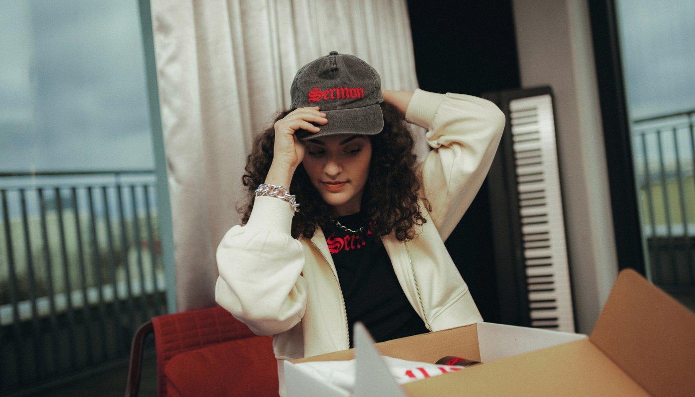 creator opening a merch package