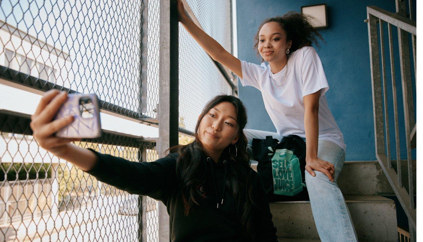 girls taking a photo for socials