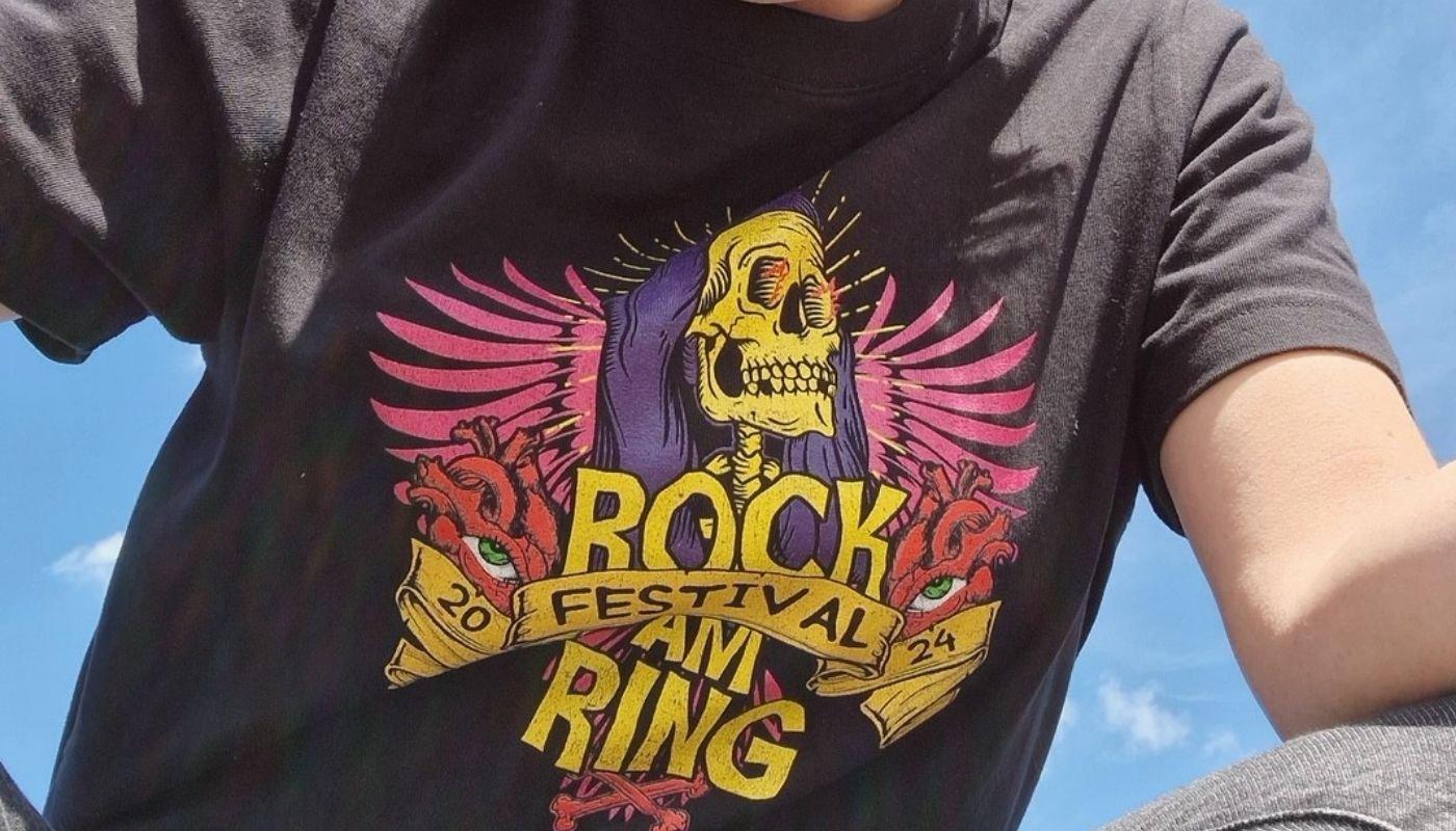 Graphic festival t-shirt design worn outdoors at a music festival