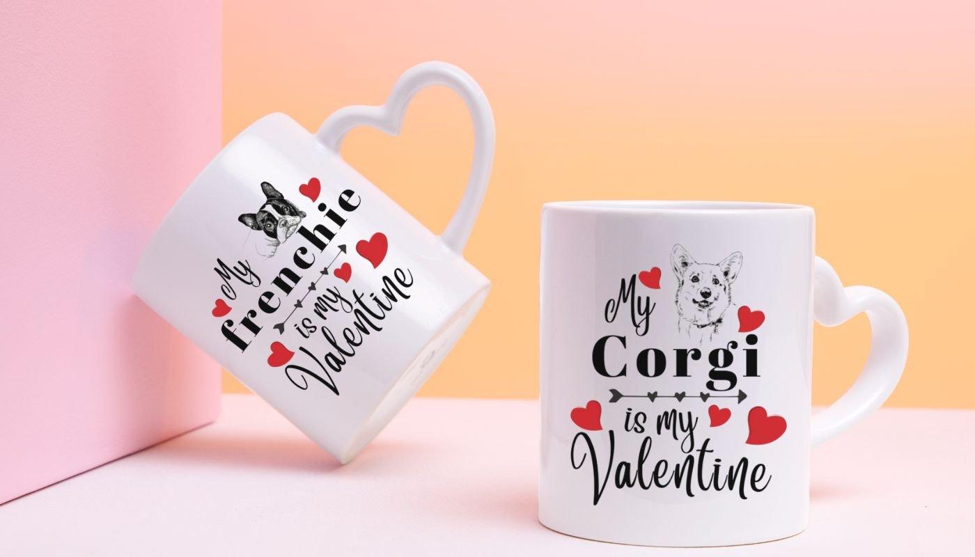 2 heart-shaped handle mugs with dog valentine designs