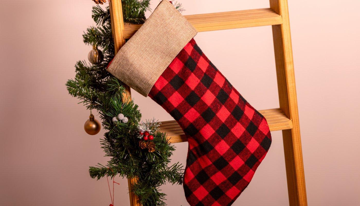 holiday flannel stocking hanging on ladder