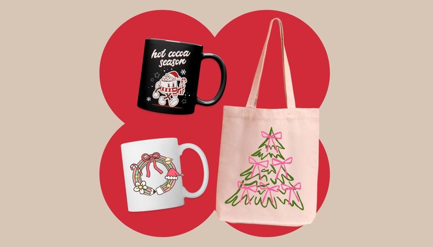 Gift bundle with two festive mugs and a pink tote bag featuring a Christmas tree design.