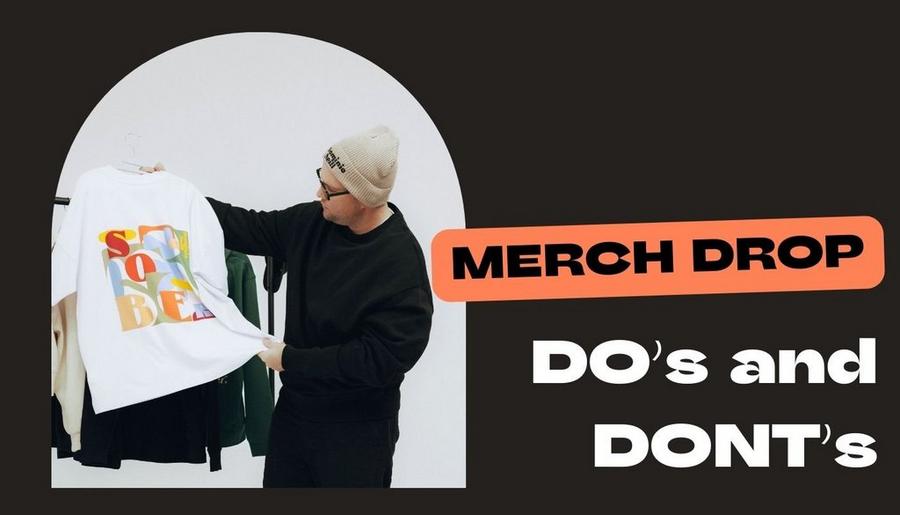 creator showing off a custom hoodie in addition to other products they made using spreadshop