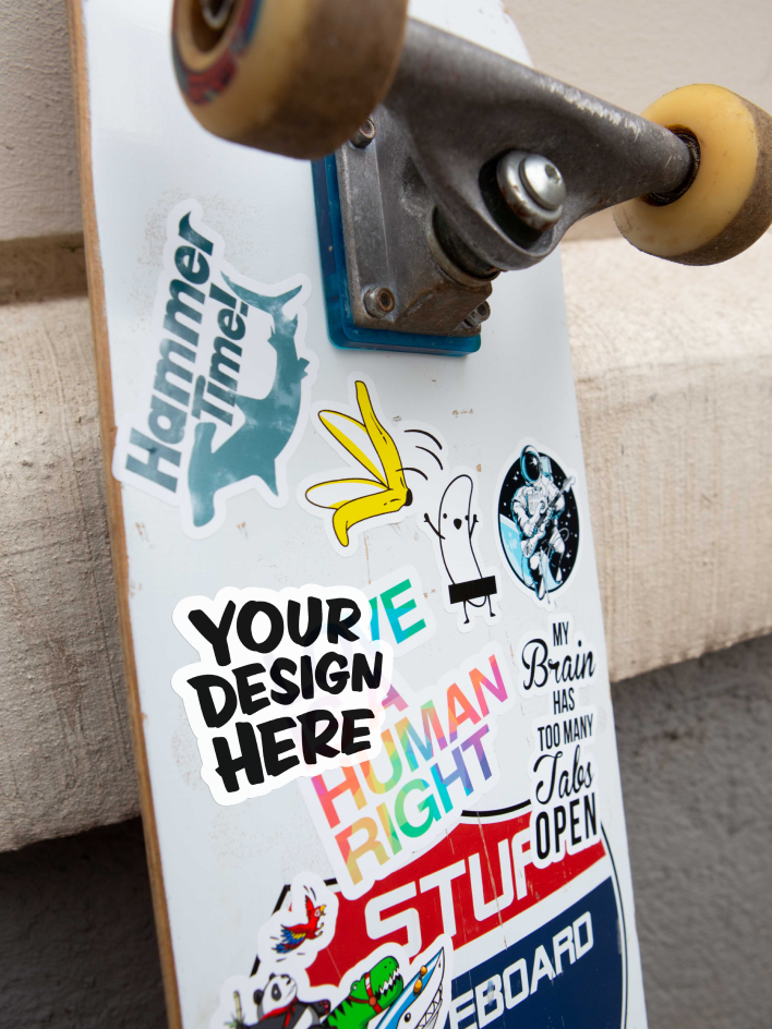 a variety of print on demand stickers on a skateboard showing printing capabilities