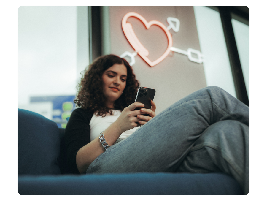 image of a print on demand seller on their phone to illustrate promotion of product