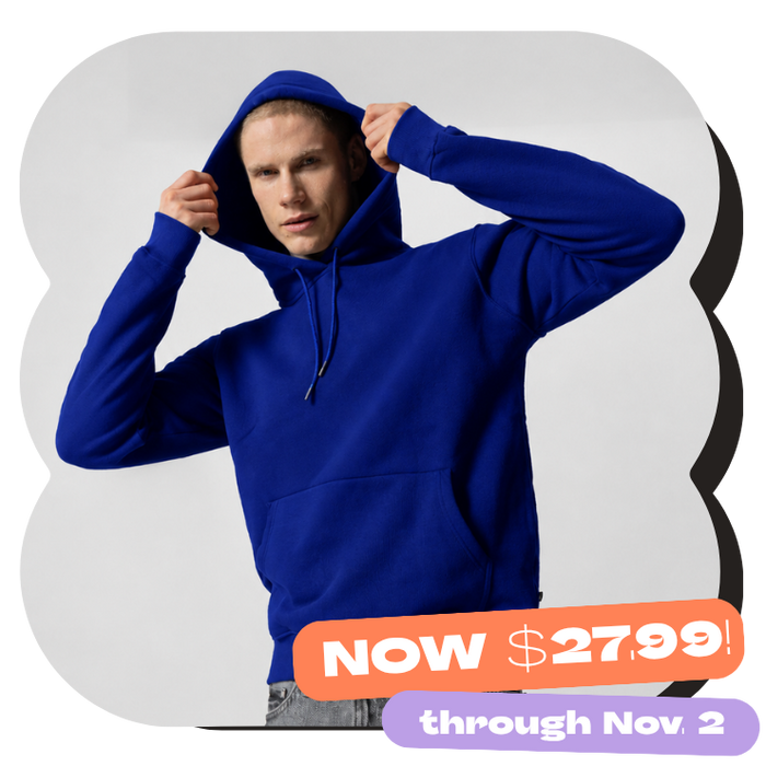 male model modeling the blue version of the men's premium hoodie from our in-house premium collection