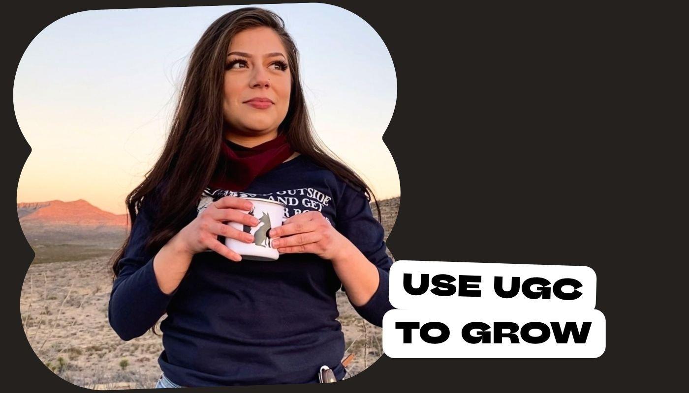 Creator wearing a custom printed sweatshirt and holding a custom mug to promote products