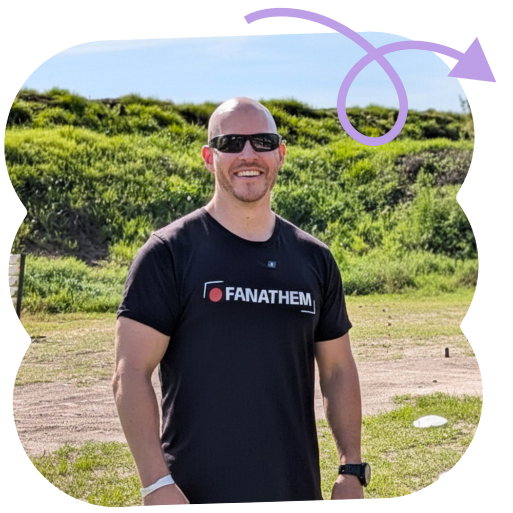 headshot of a spreadconnect merchant wearing a custom printed t-shirt