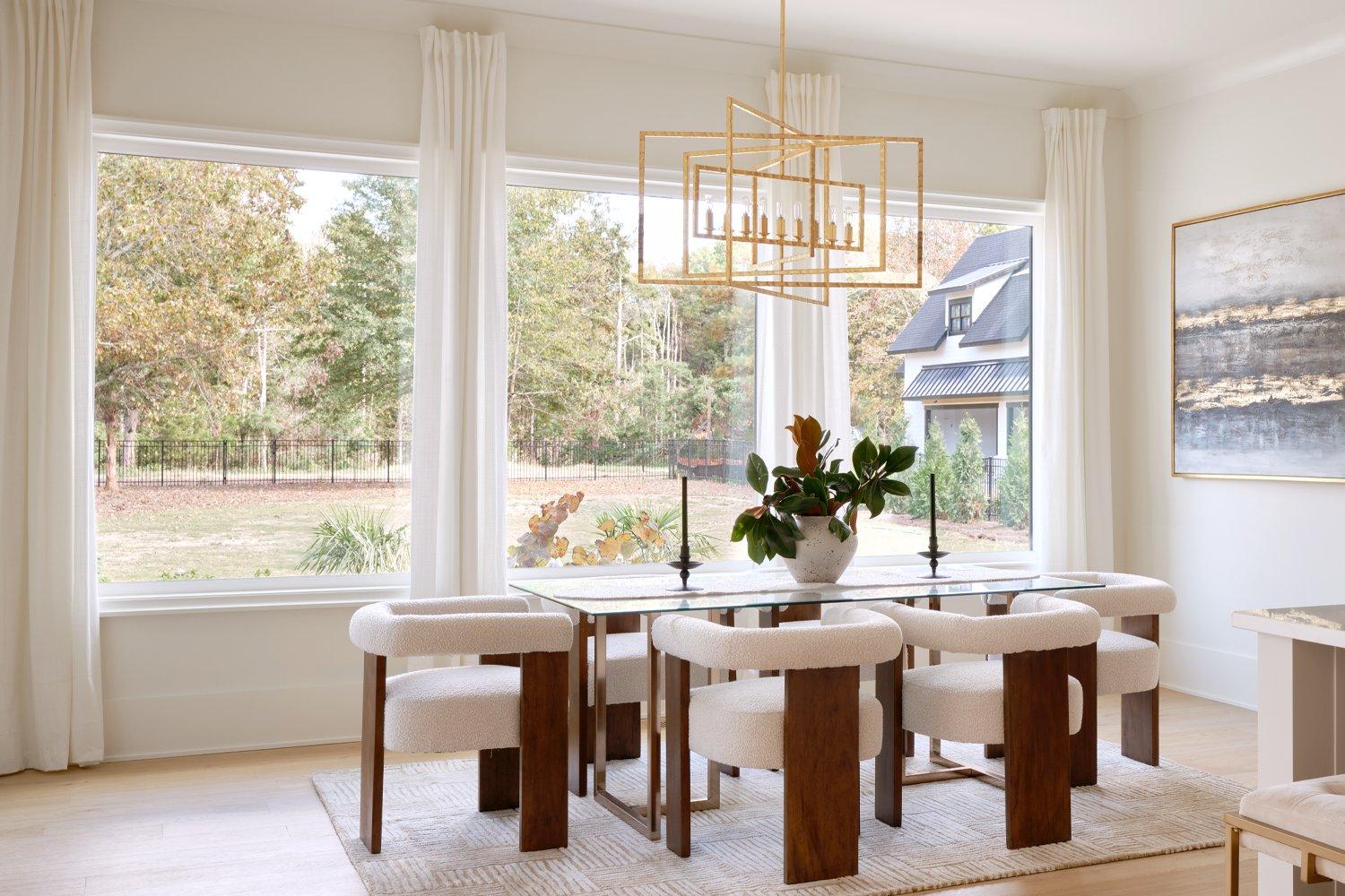 Modern Dining Area featuring Pella® 250 Series Vinyl Fixed Windows