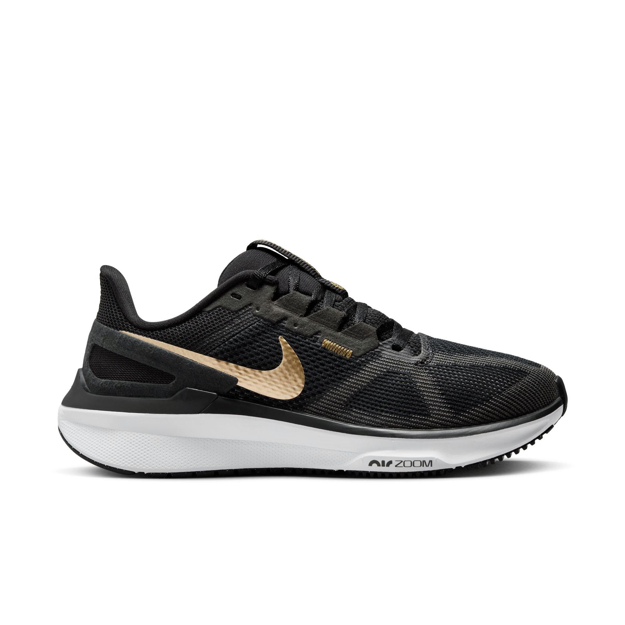 Nike free run black clearance and gold