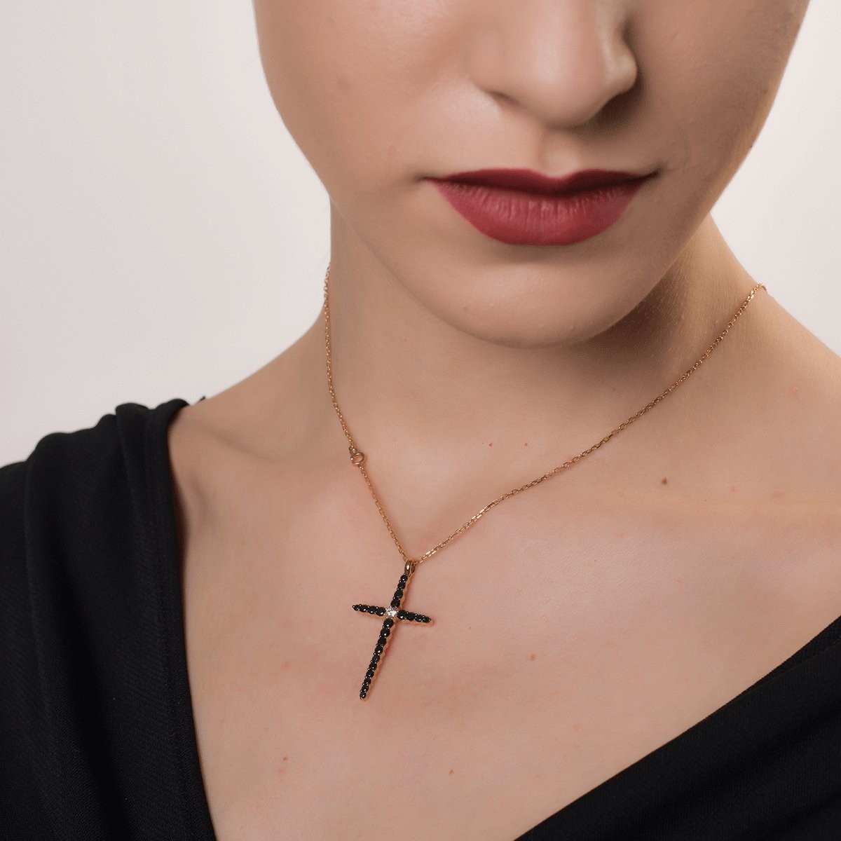 18K rose gold cross pendant necklace with 0.11ct clear diamonds and 0.94ct black diamonds