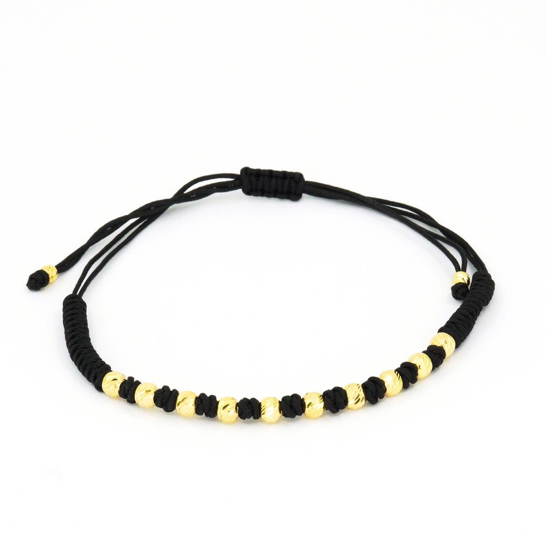 Black cord bracelet with 14K yellow gold