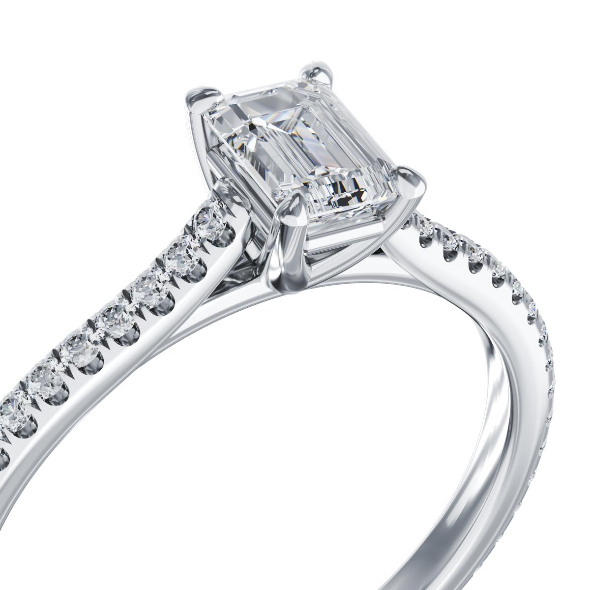 Platinum engagement ring with 0.4ct diamond and 0.2ct diamonds