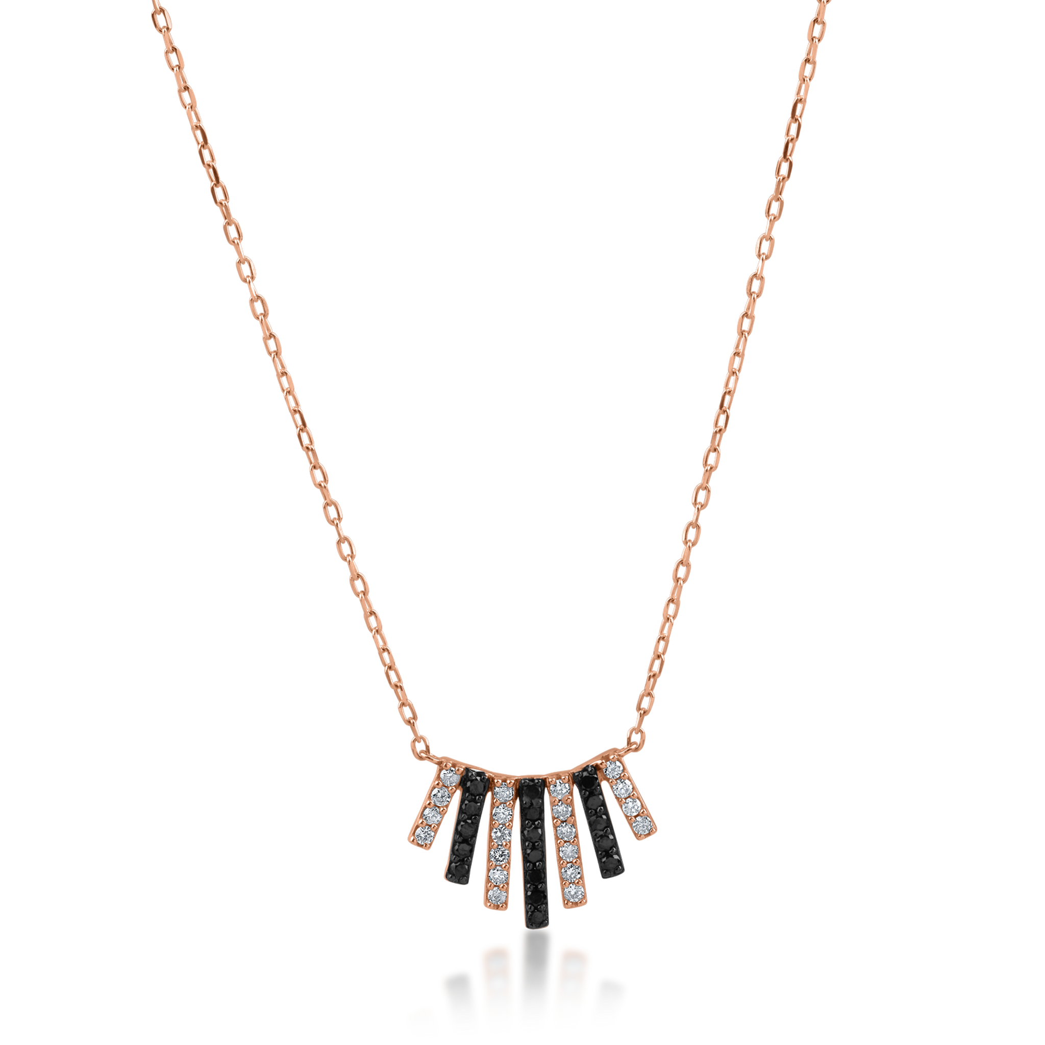 Łańcuszek z wisiorkiem z różowego złota z czarnymi i przezroczystymi diamentami o masie 0.32ct