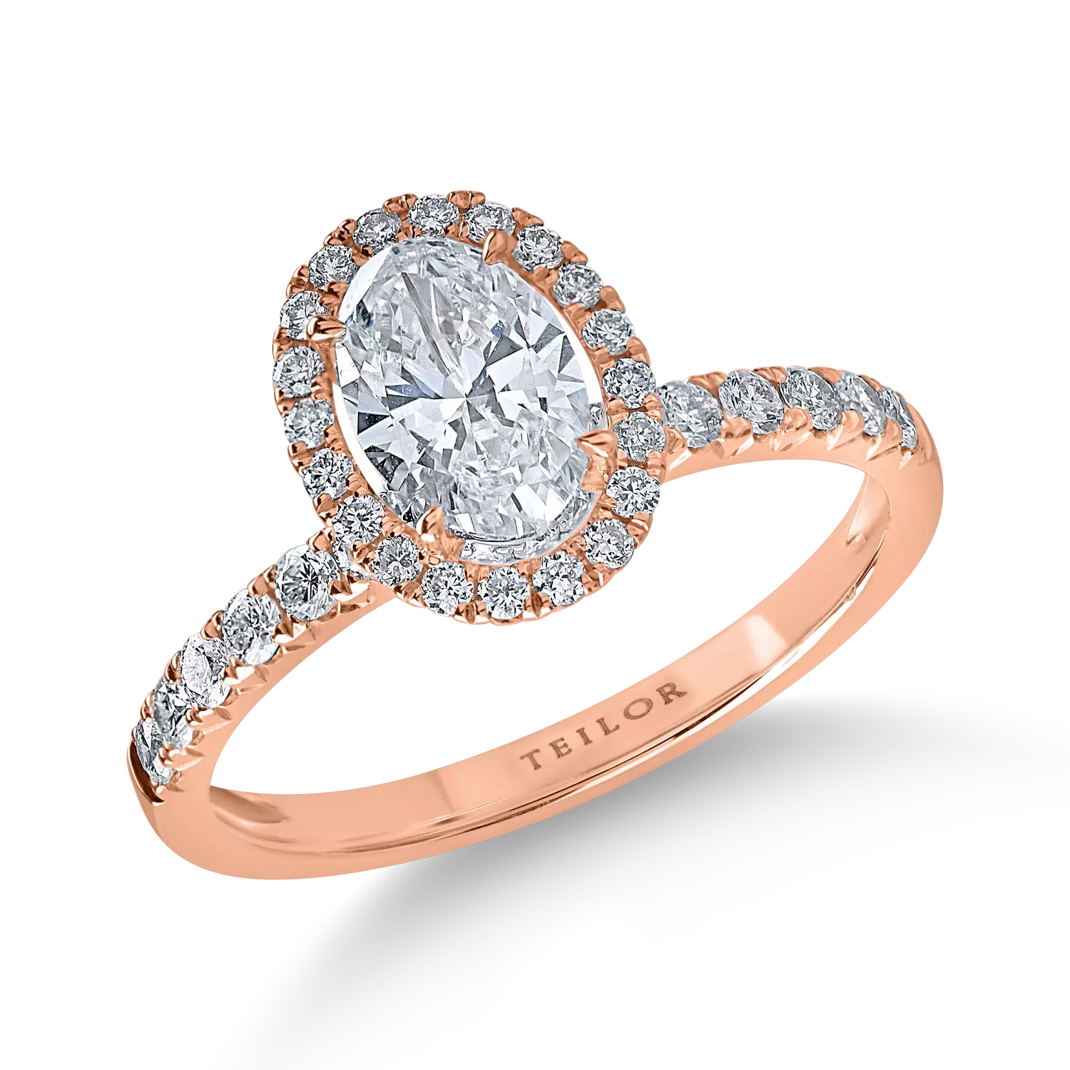 Pierścionek zaręczynowy z różowego złota z diamentami o masie 0.7 ct i 0.4 ct