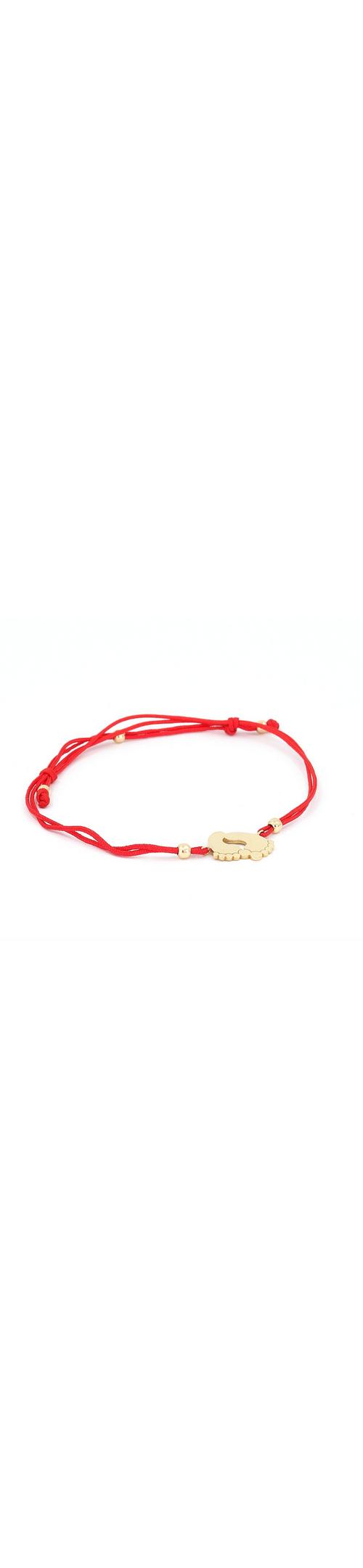 Red cord bracelet with 14K yellow gold baby feet charm