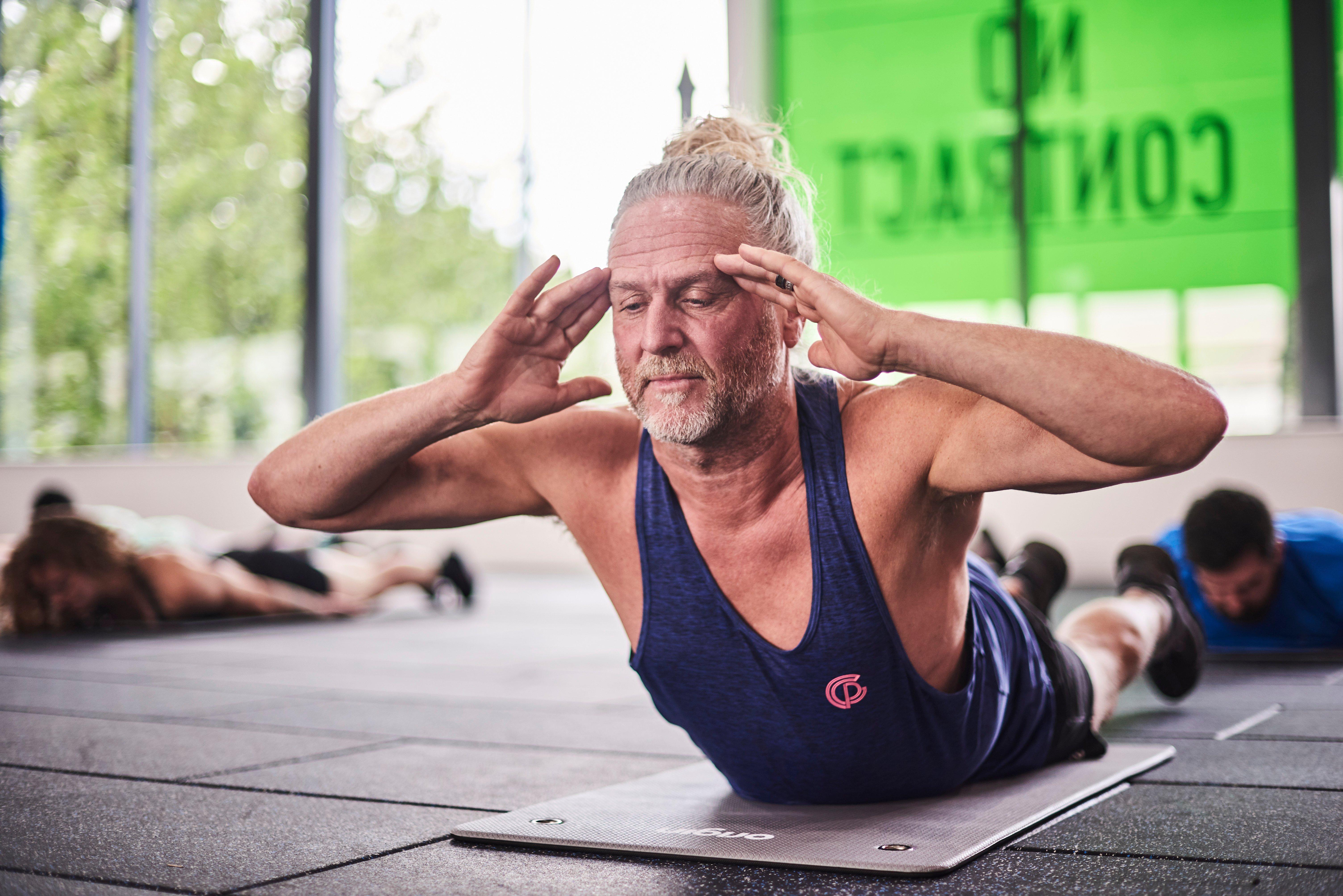 Member at a yoga class
