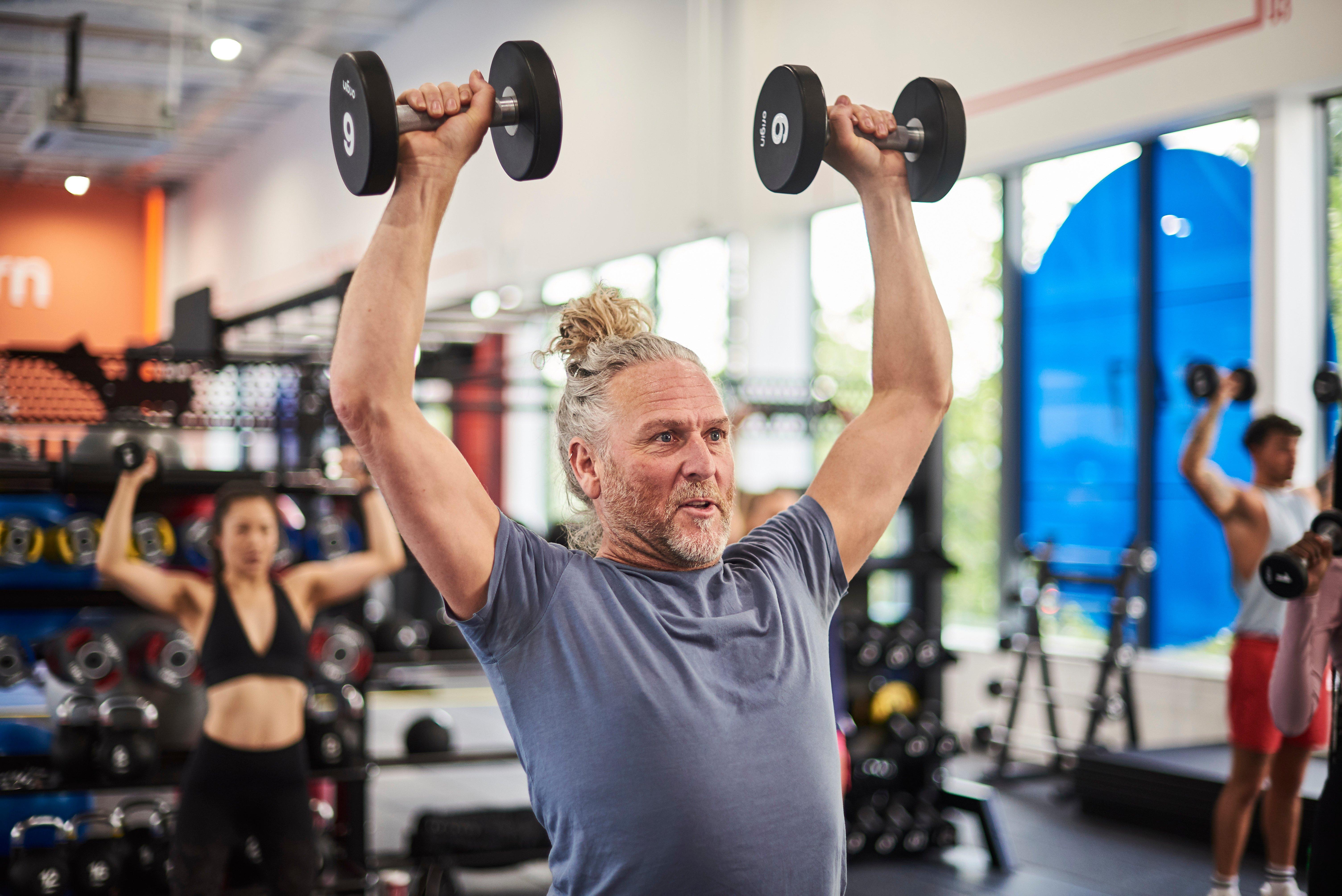 Member at a upper body blast class