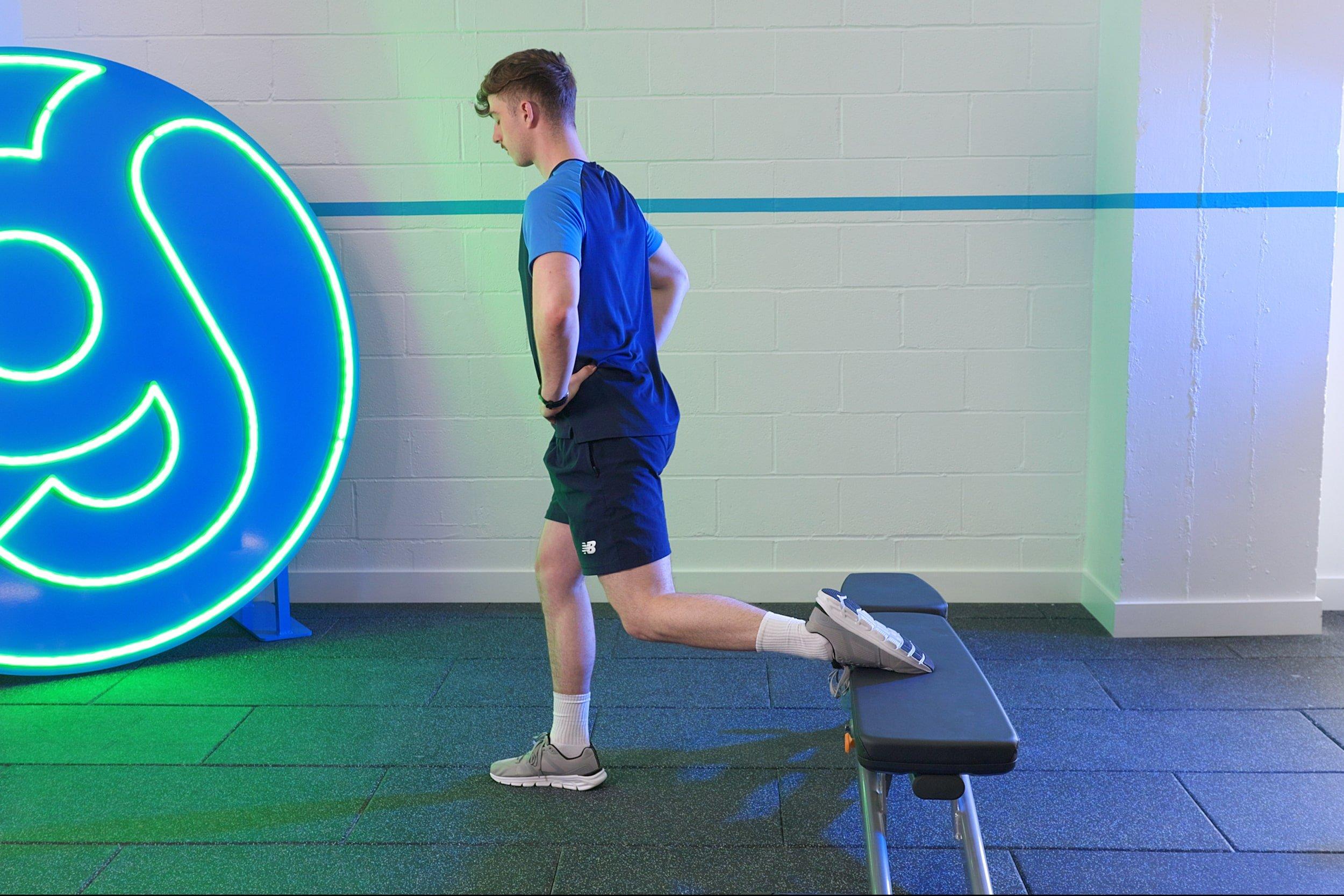 Member doing Bulgarian Split Squats
