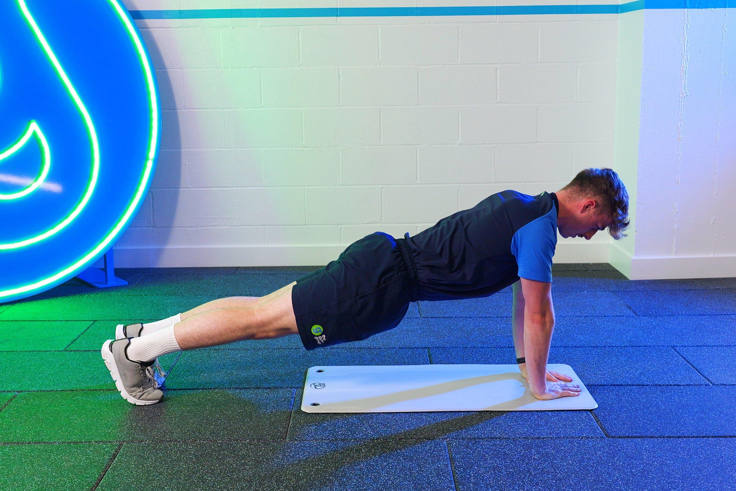 Member doing diamond push ups