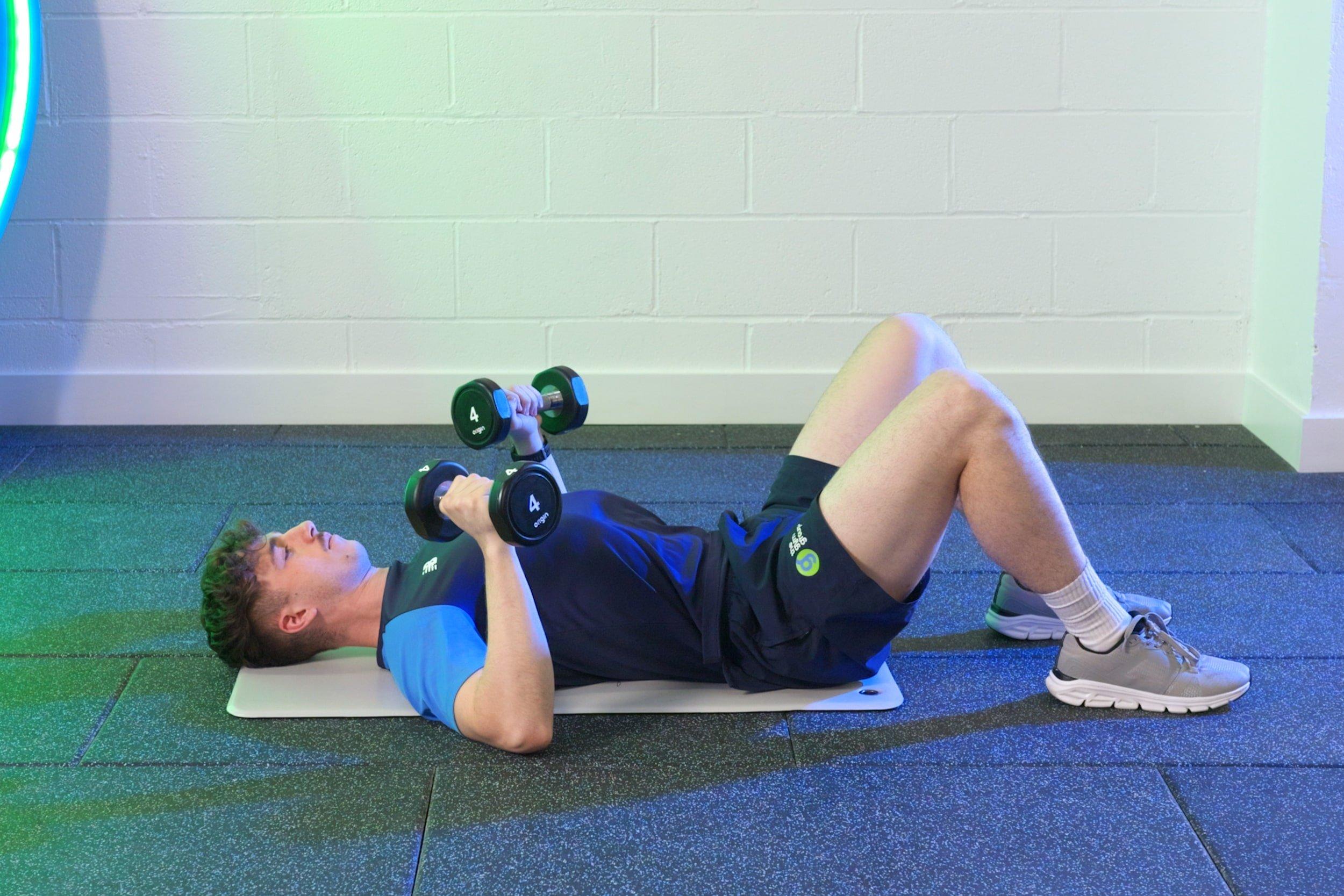 Member doing  Floor presses