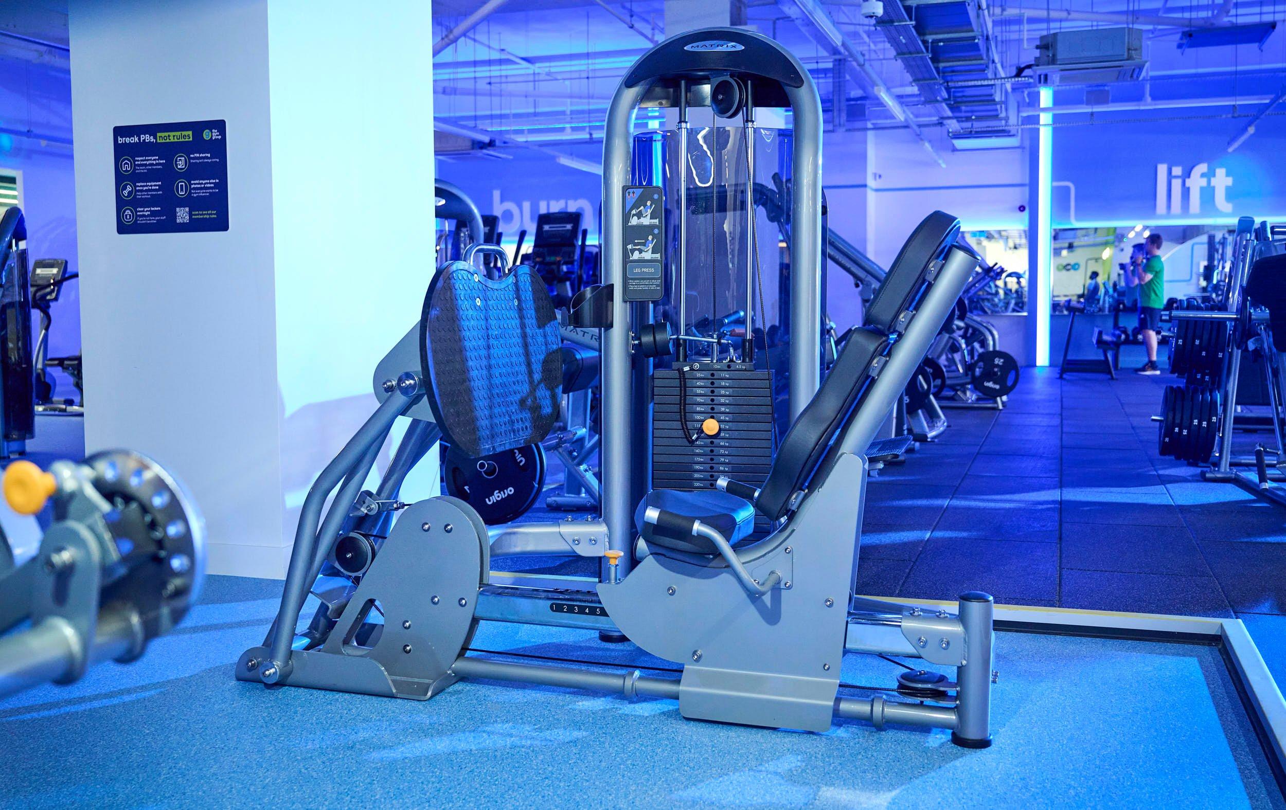 Member doing Barbell exercises