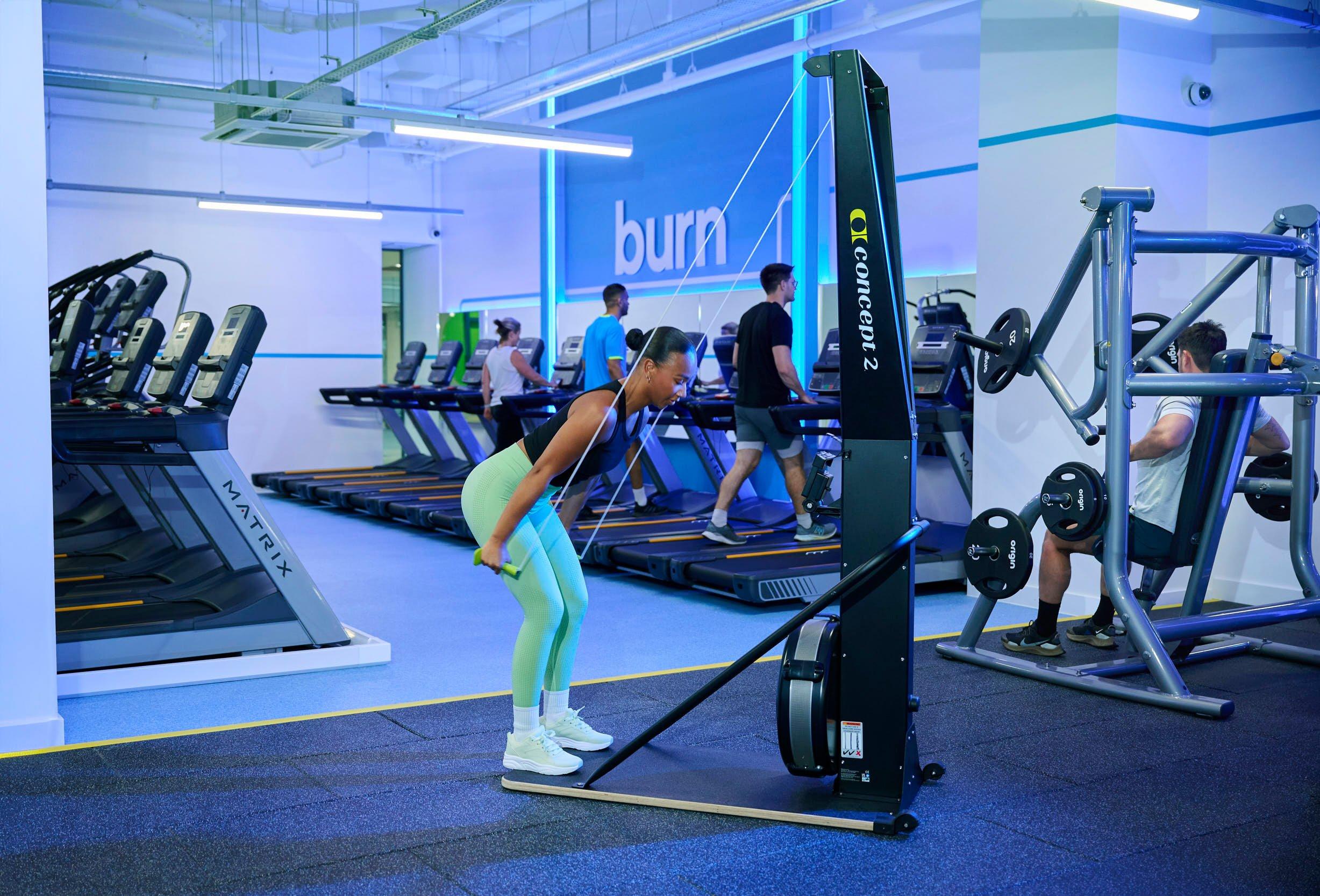 Gym member training on the Ski erg machine.