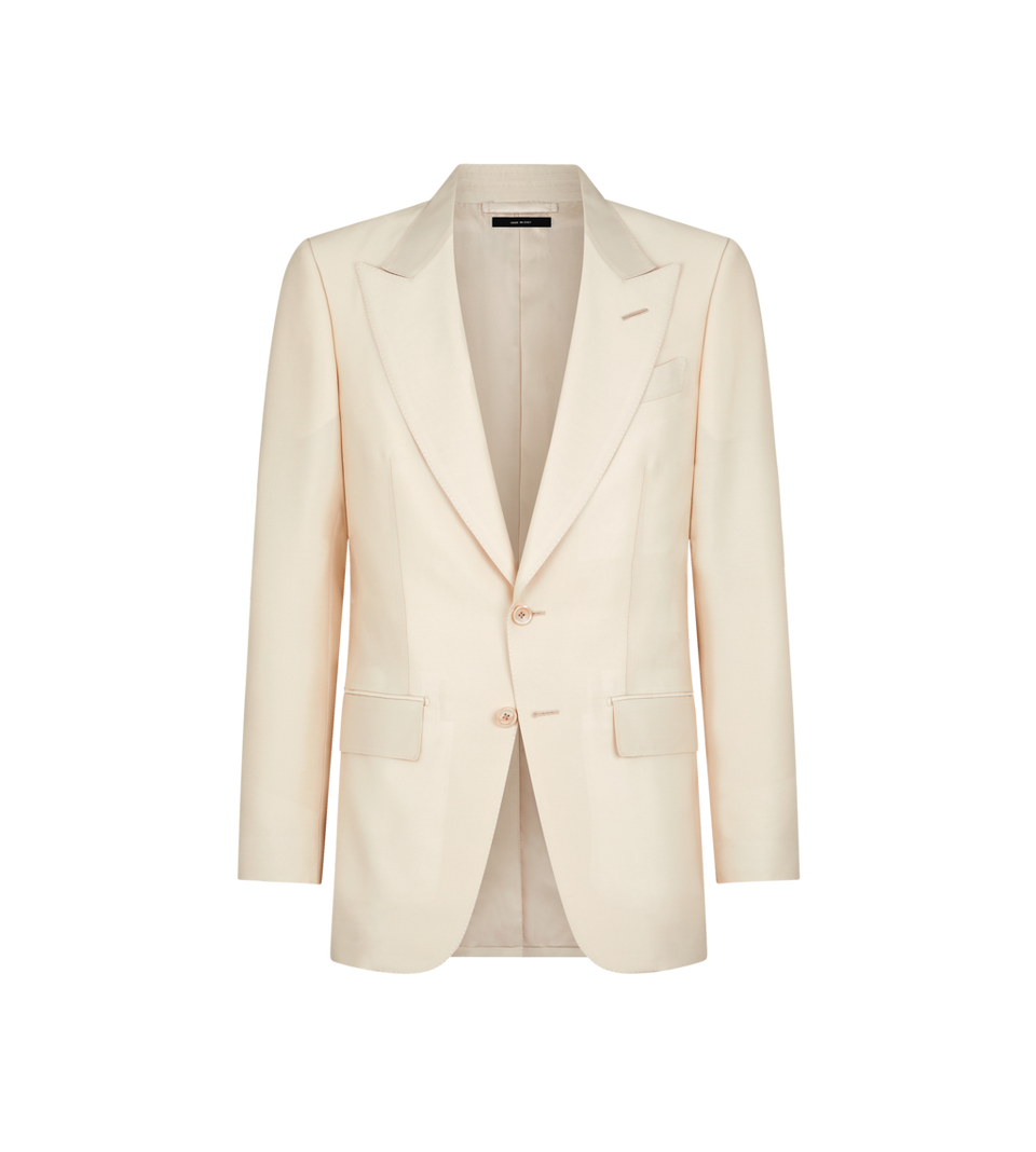 a tan colored suit jacket