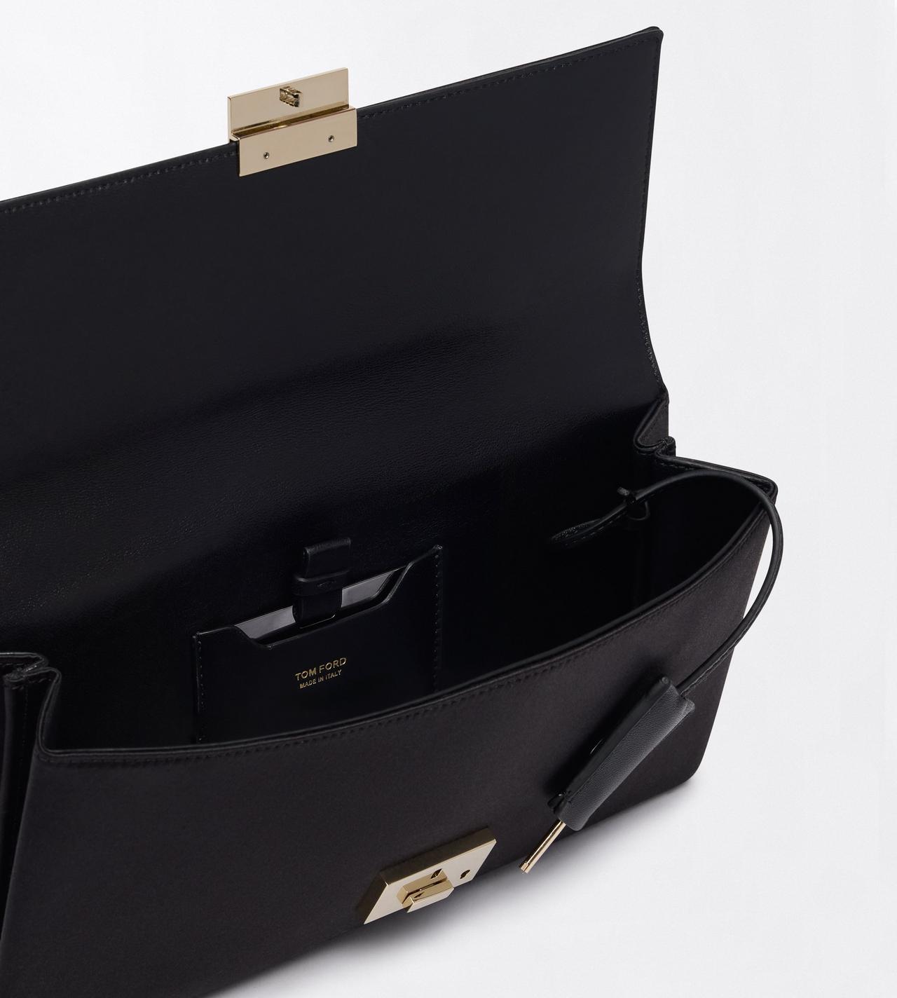 TOM FORD  BLACK LARGE LEATHER GOODS CLUTCH
