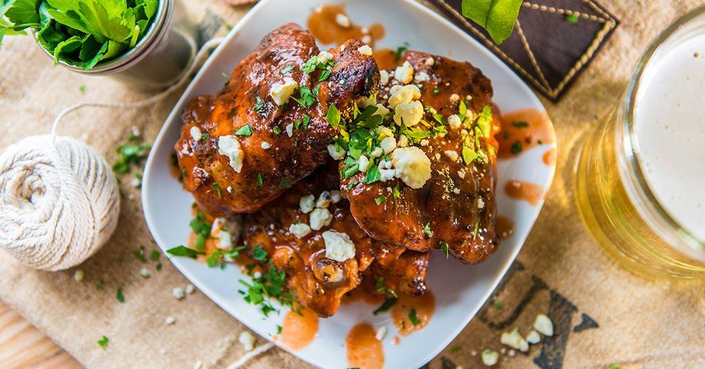Crispy Chicken Thighs with Buffalo Sauce | Traeger Grills