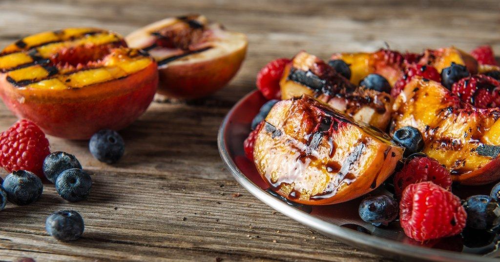 Grilled Stone Fruit with Berries & Cream Recipe - Traeger