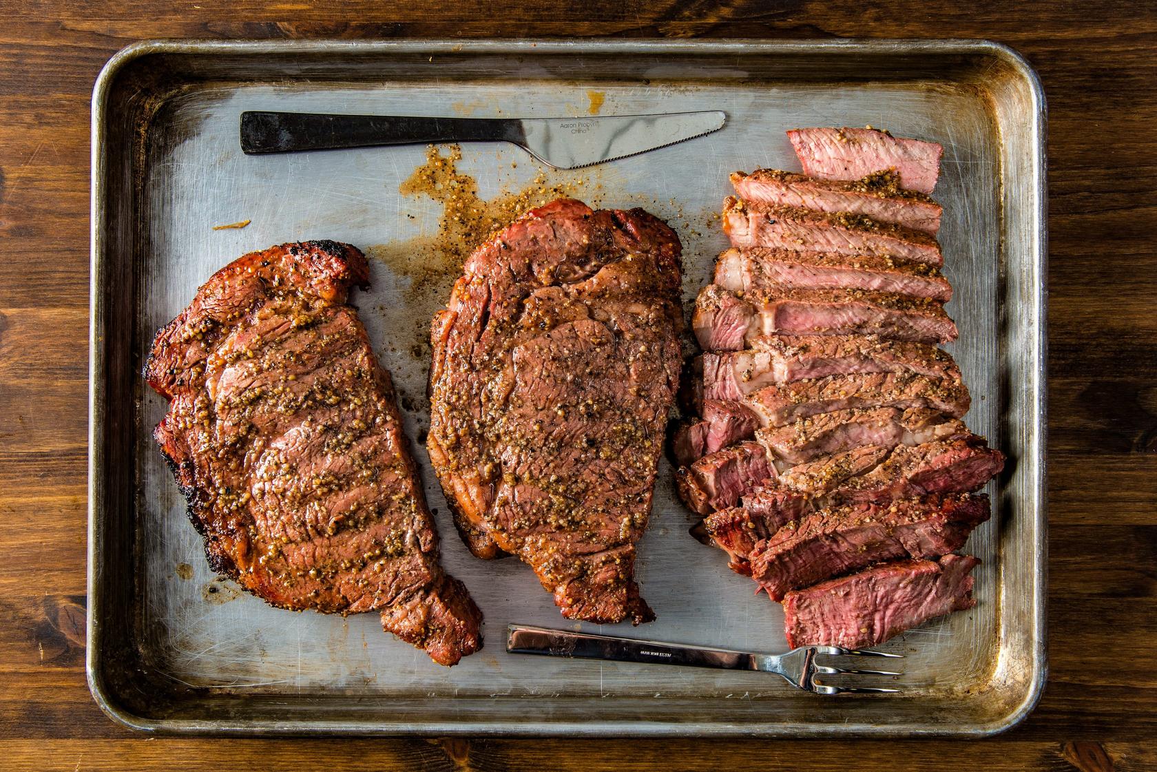 Grilled Ribeye steaks by Doug Scheiding