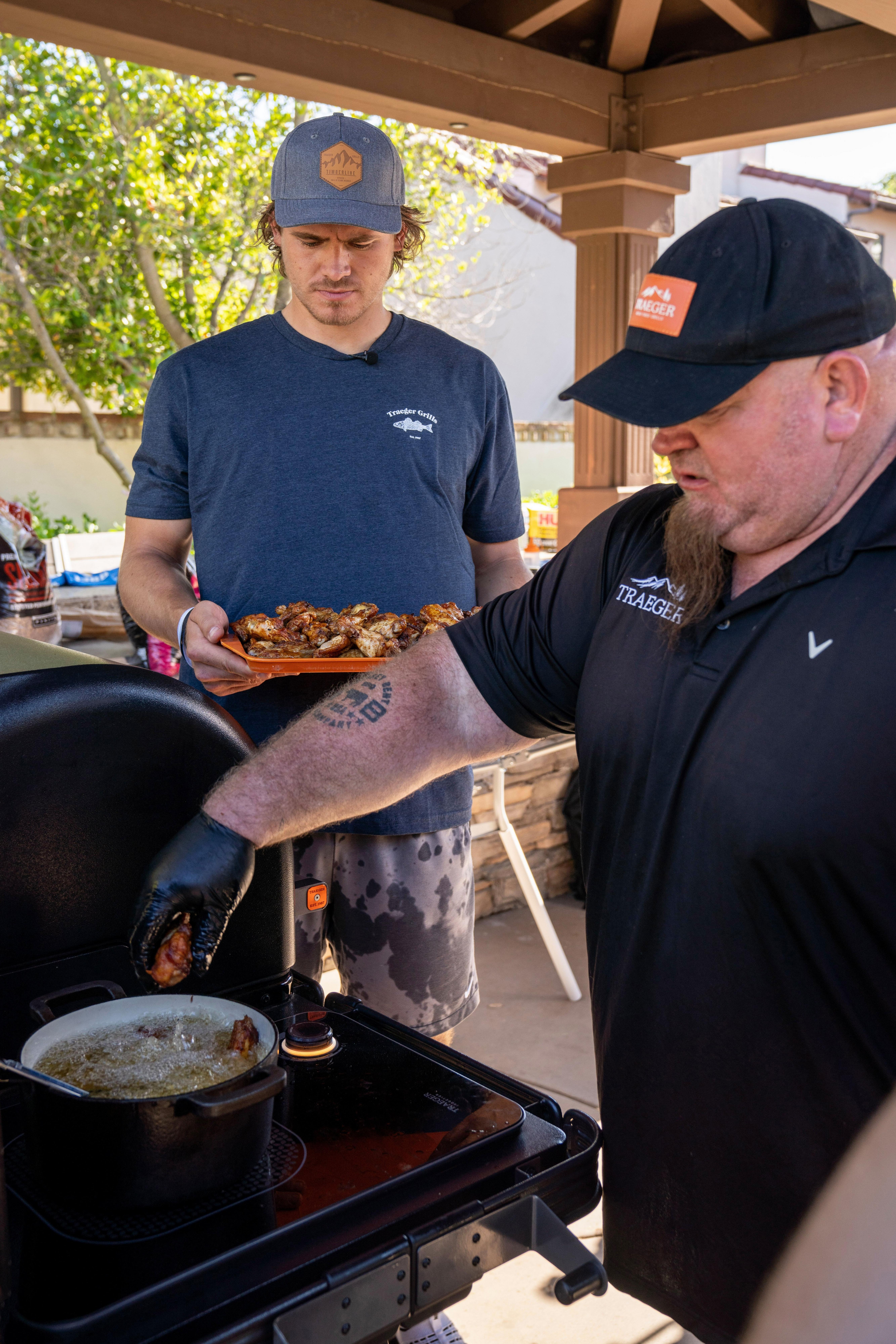Justin Herbert and Chad Ward_Game Day Dou_Presenting Wings_004
