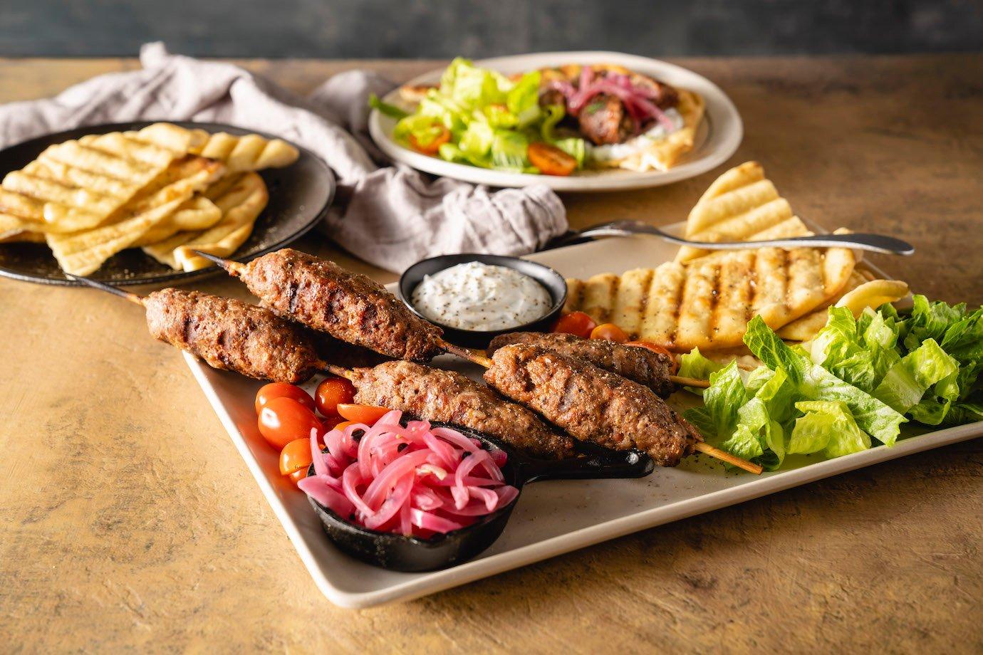 Pork Skewers with Grilled Pita and Pickled Red Onions | Traeger Grills