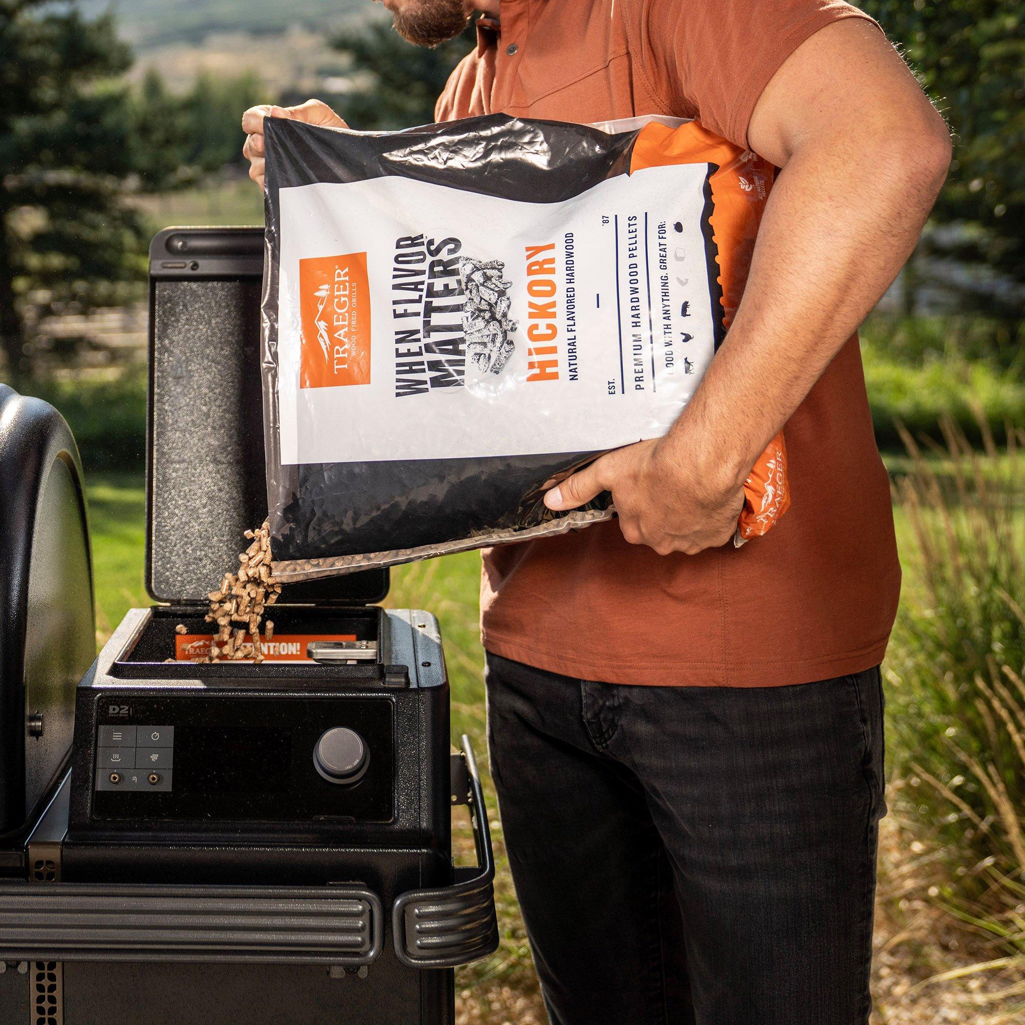 traeger-2024-hickory-pellets-lifestyle-pour