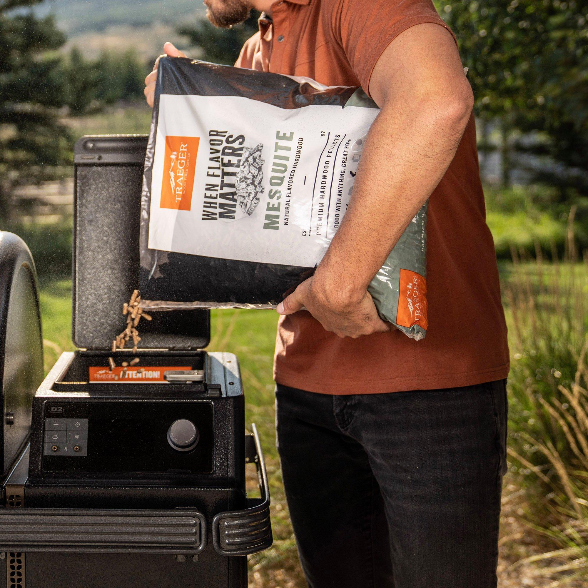 traeger-2024-mesquite-pellets-lifestyle-pour