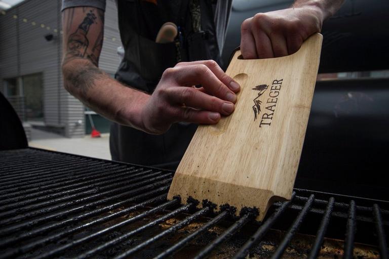 traeger-wooden-grill-grate-scraper-lifestyle
