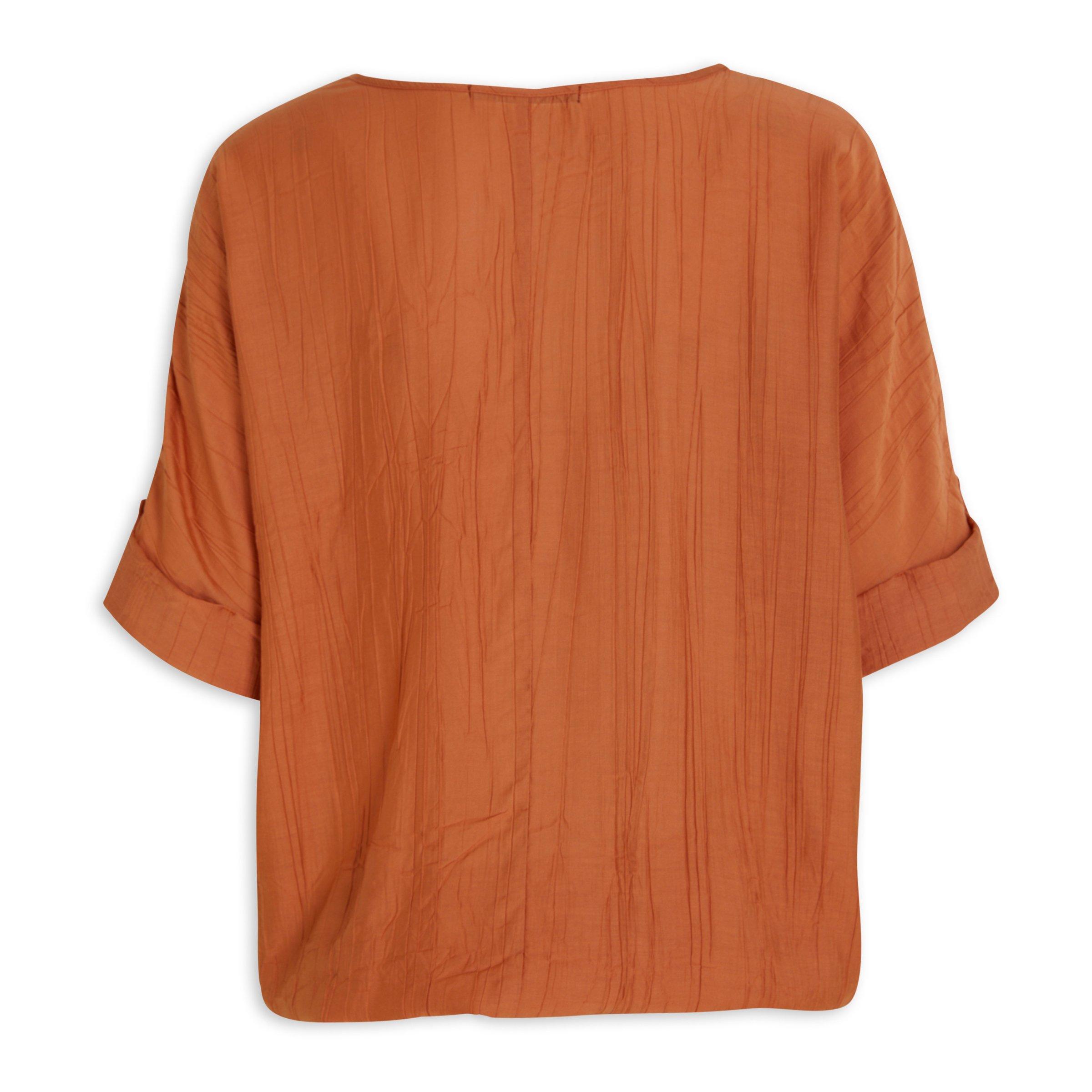 women's burnt orange blouse