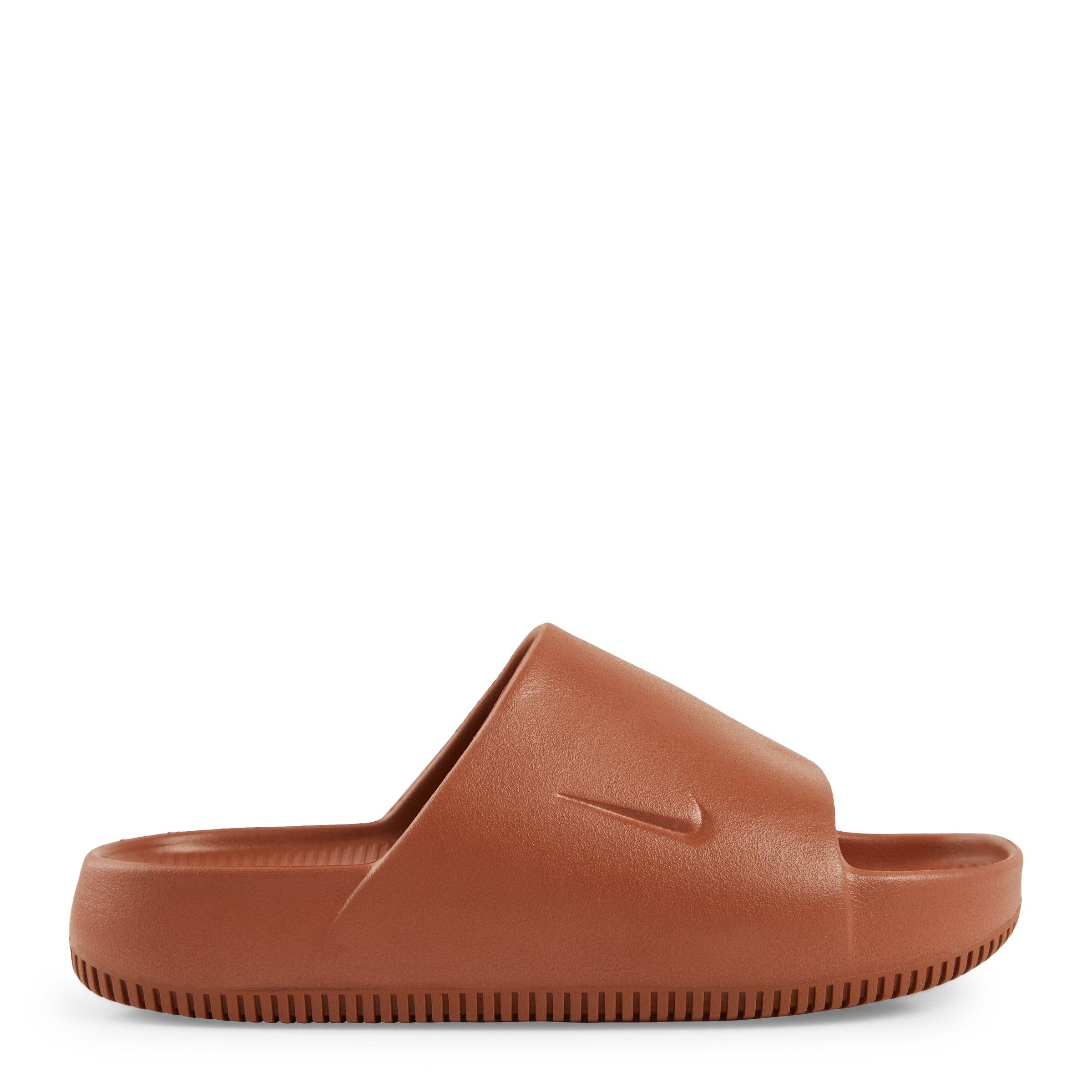 Tan best sale nike slides