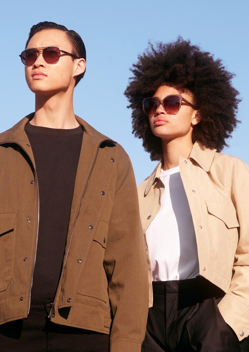 Man and Woman wearing TUMI sunglasses