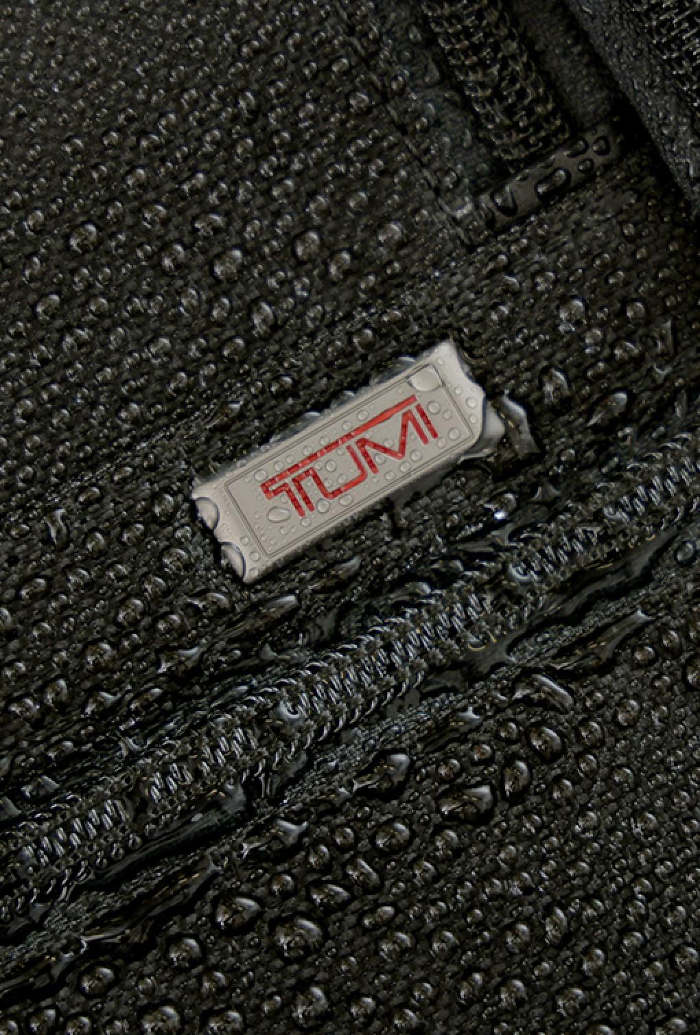 Tumi logo on bag