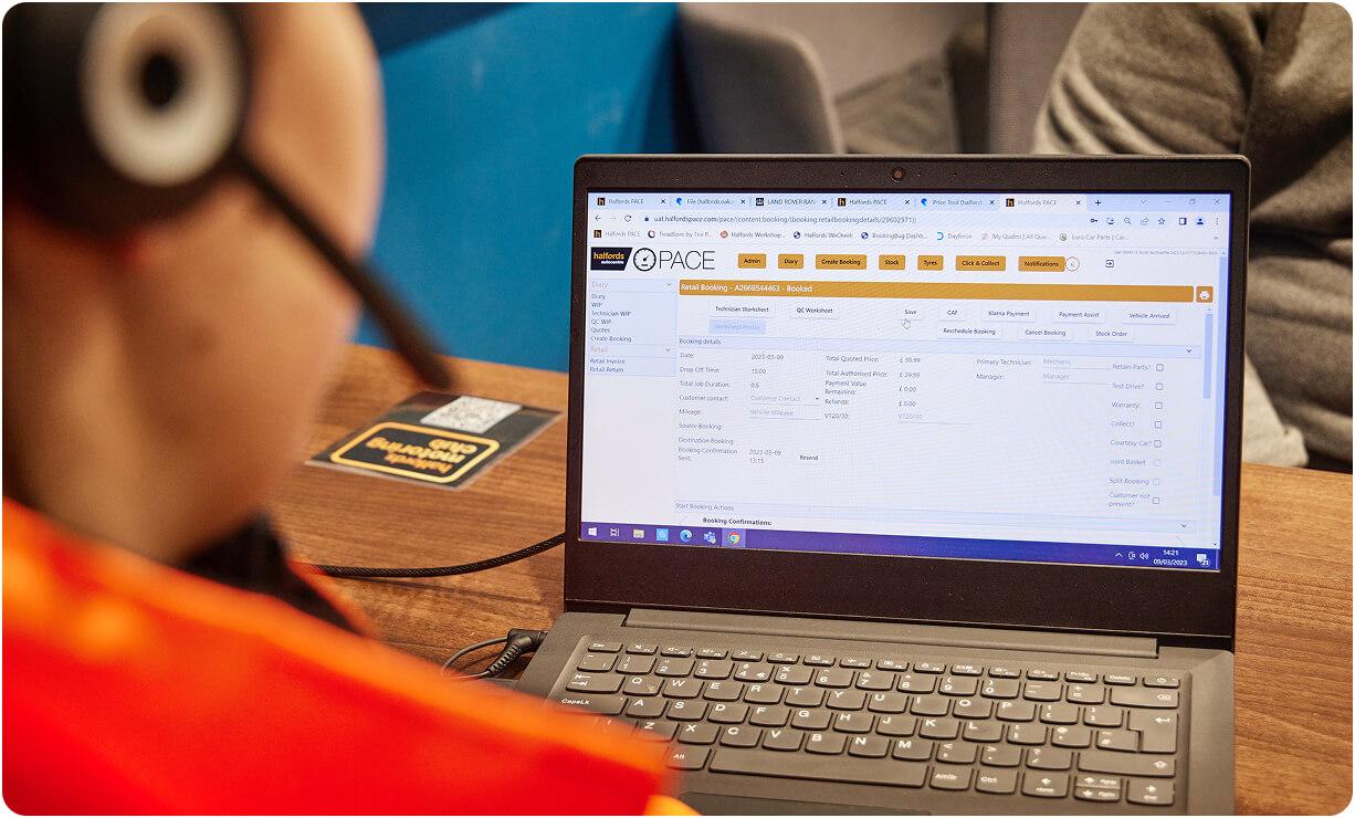 Technician updating a digital service record
