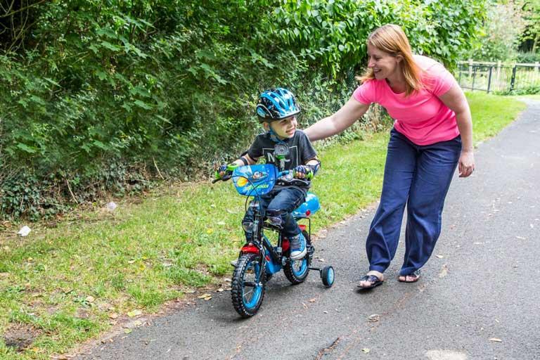 How to train a best sale child to ride a bike