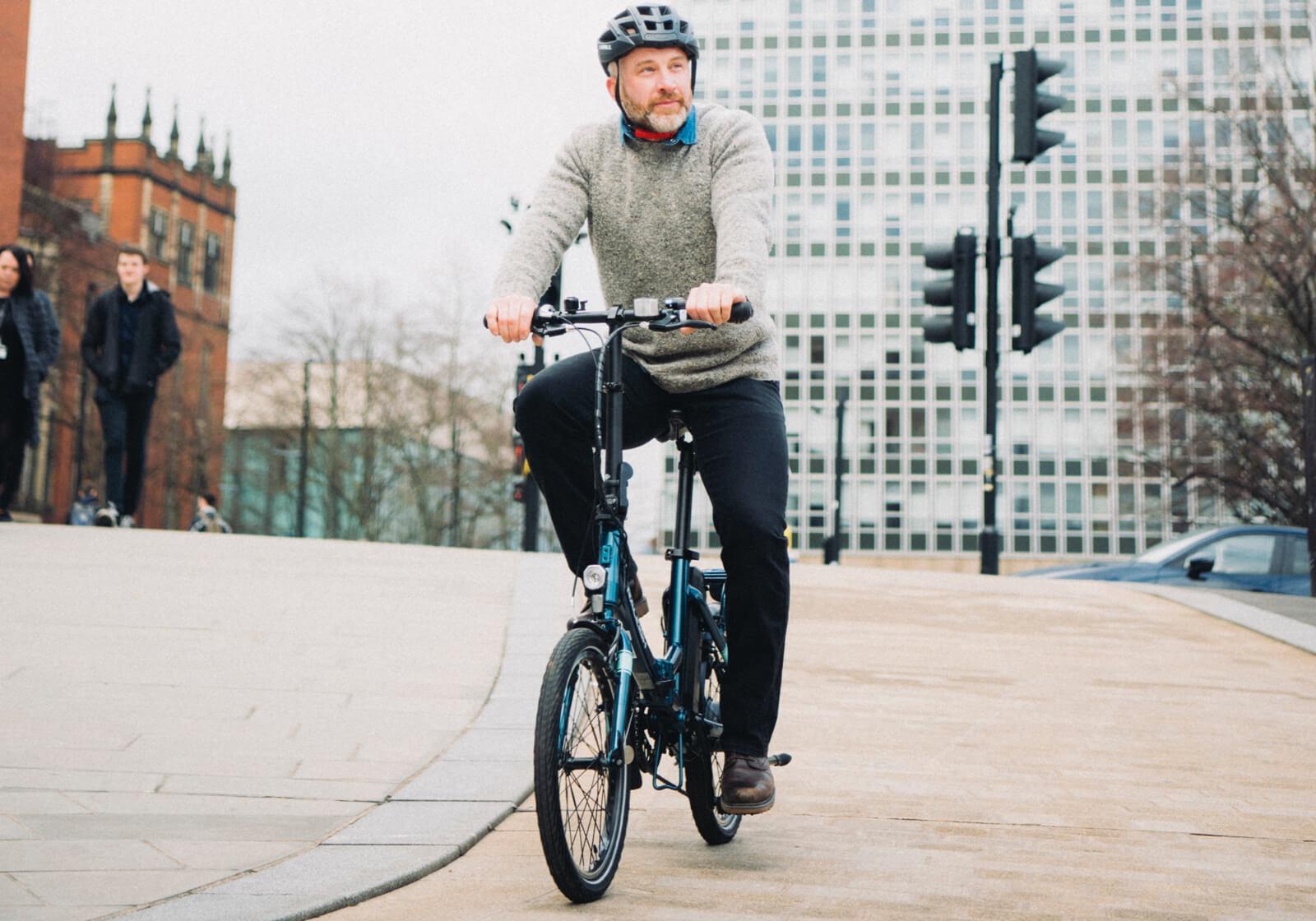 Riding a shop folding bike