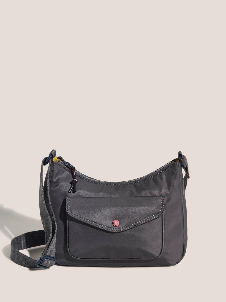 Greta Crescent Xbody Bag in LIGHT GREY - MODEL FRONT