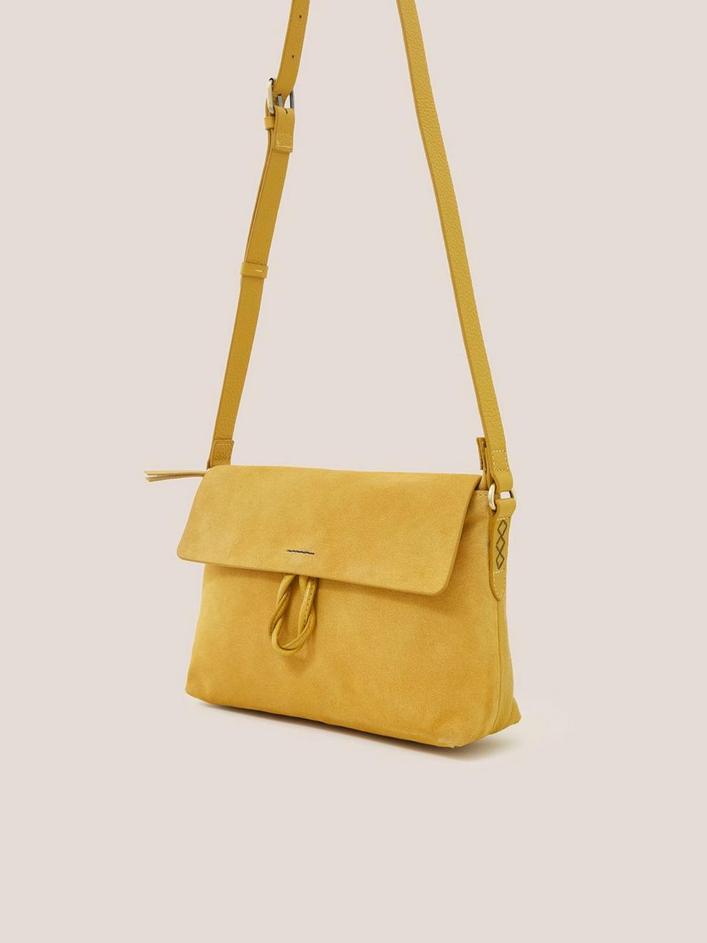 Josie Suede Crossbody Bag in SUNSHINE YELLOW - MODEL FRONT