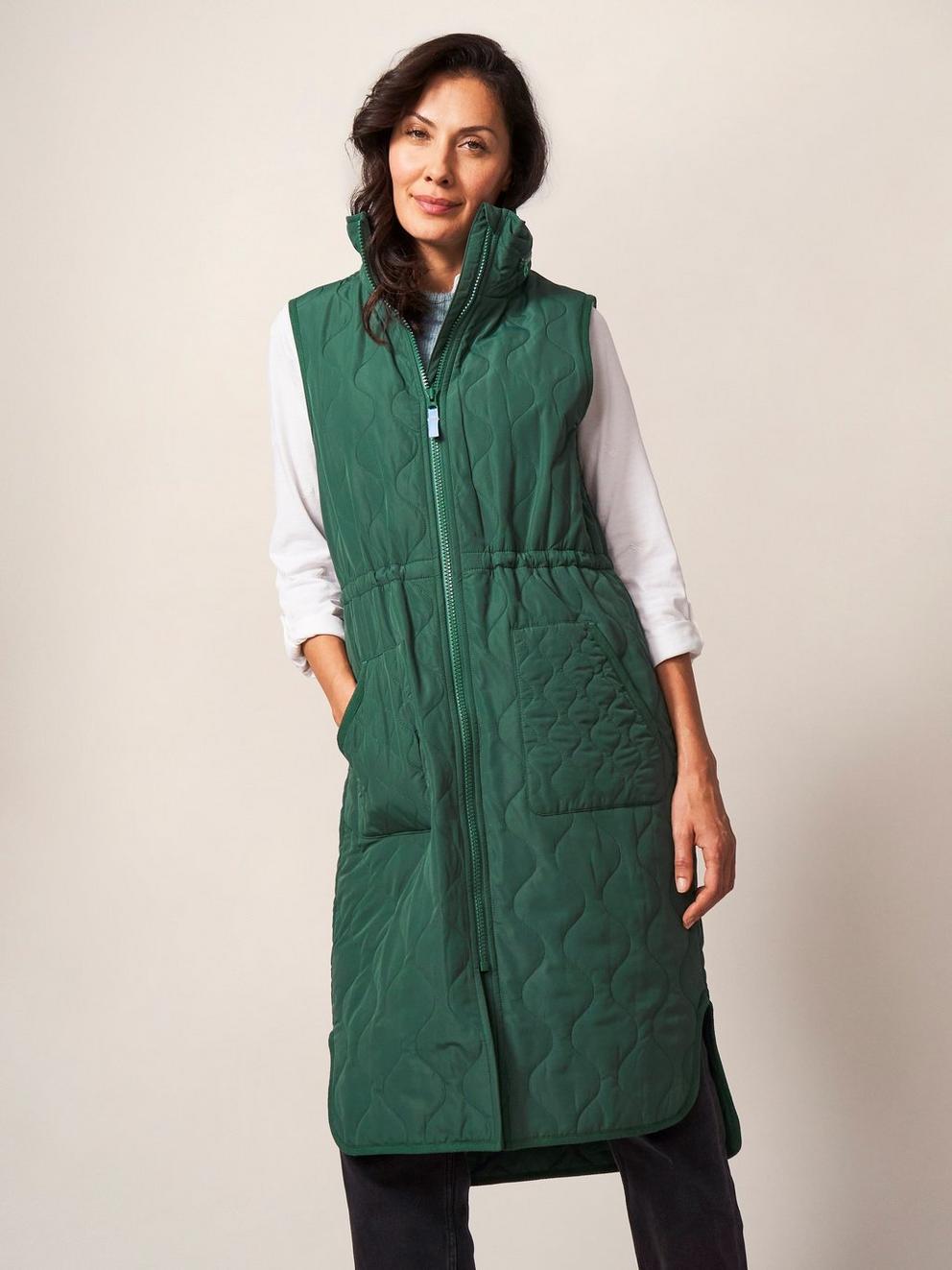 Haweswater Funnel Gilet in PERIDOT GREEN PLAIN - MODEL FRONT