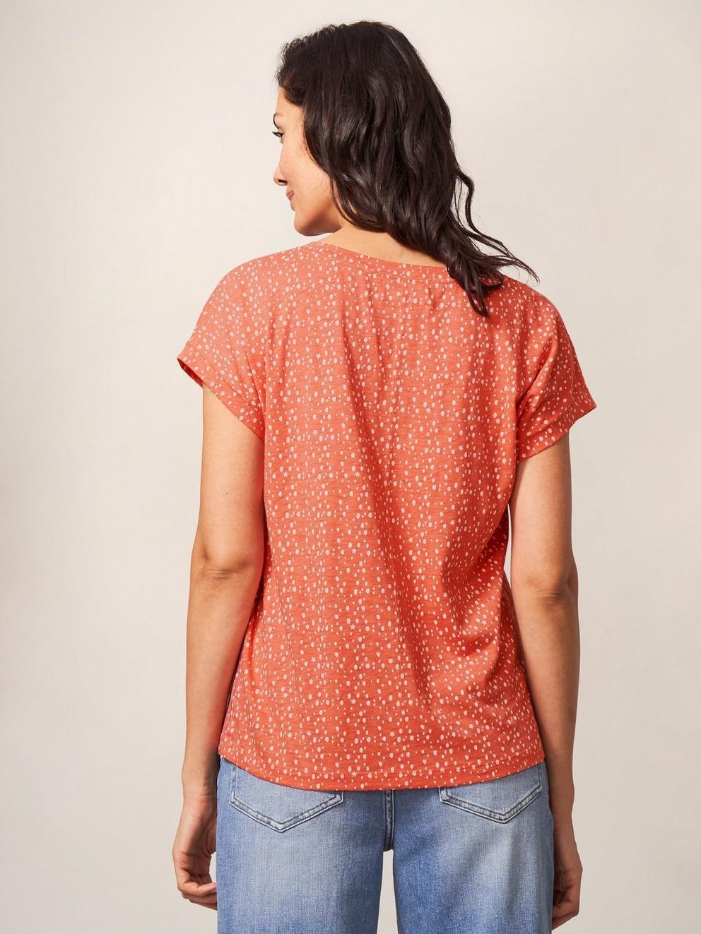 Essence Organic Cotton Tee in TOASTED ORANGE STRIPE - MODEL BACK