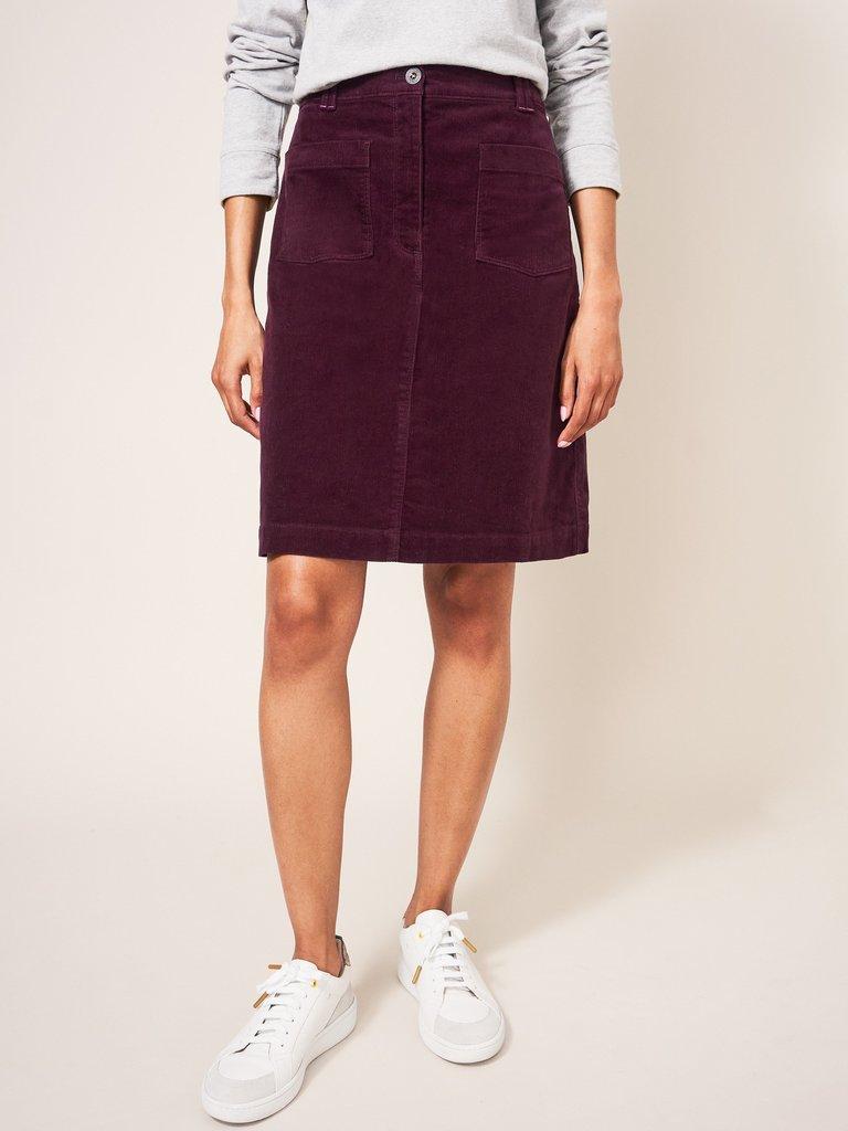 Clocktower Bloom Cord Skirt in MULBERRY PINK PLAIN - MODEL FRONT